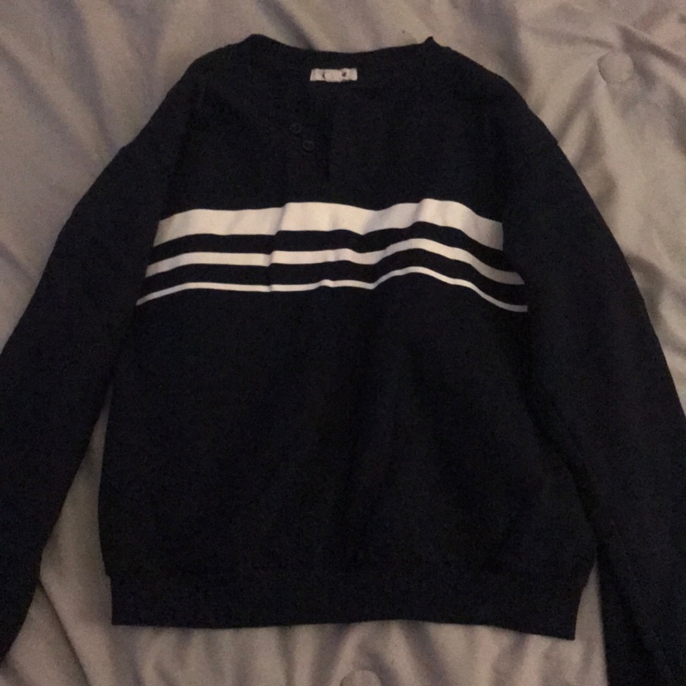 A sweater of some sort, Some sort of cardigan.